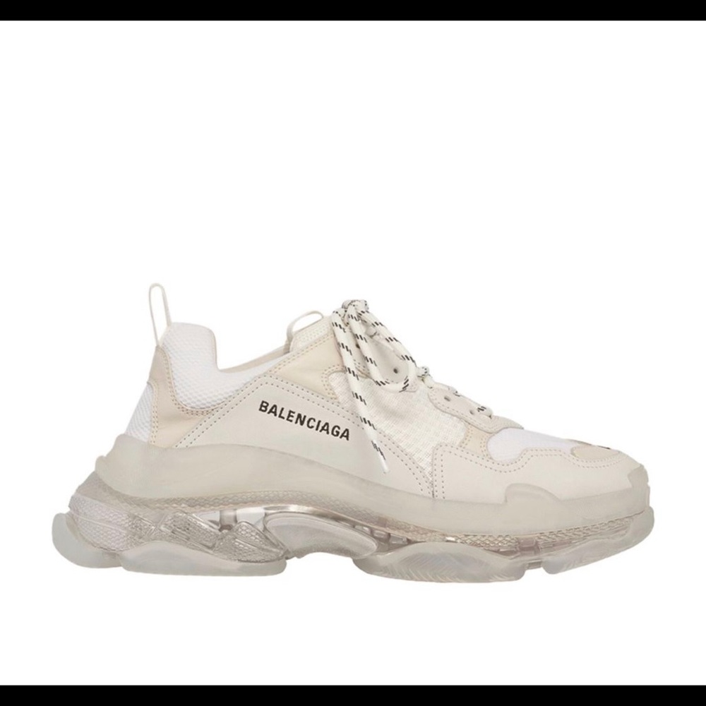 Selling a pair of Valenciaga sneakers never worn still in the box .